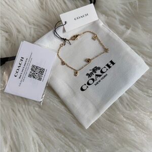 COACH Gold Charm Bracelet with Logo Dust Bag